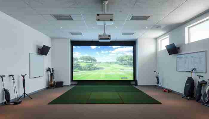 Indoor golf simulator room with screen and projector illustrating room-fit and installation decisions